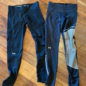 2 pairs of Under Armour black leggings size small.